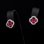 Ruby cloverleaf earrings with diamonds in white gold