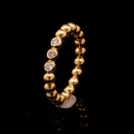 Ball ring in yellow gold with 3 diamonds