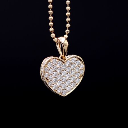 Pave diamond heart pendant yellow gold