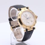 Cartier Pasha Dual Time Power Reserve in yellow gold on leather strap